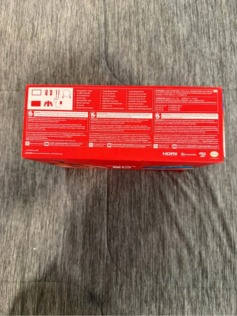 Nintendo Switch Console with Blue and Red Joy‑Con Controllers